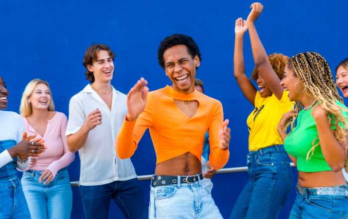 dancing people celebrating transgender awareness month