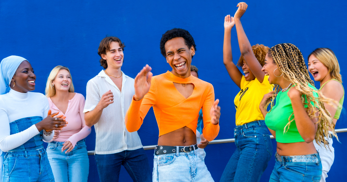 dancing people celebrating transgender awareness month