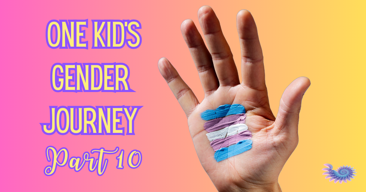 Child's hand painted with colors from the trans flag with an ombre background