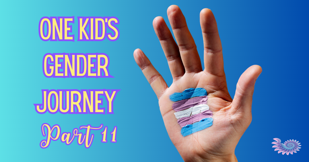 Child's hand painted with colors from the trans flag with an ombre background