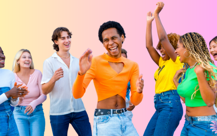 Happy group of people dancing and laughing and celebrating transgender awareness month