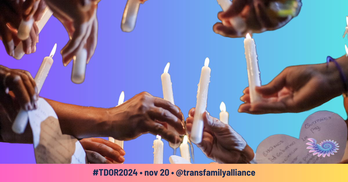 Hands lighting candles memorializing victims of hate and violence and in commemoration of Transgender Day of Remembrance (#TDOR)