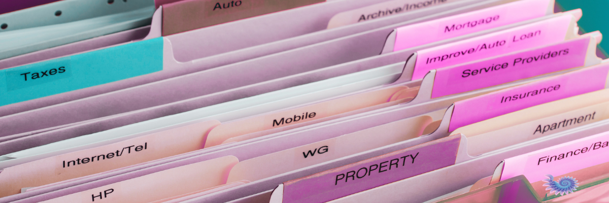 Up close filtered image of documents in a filing cabinet