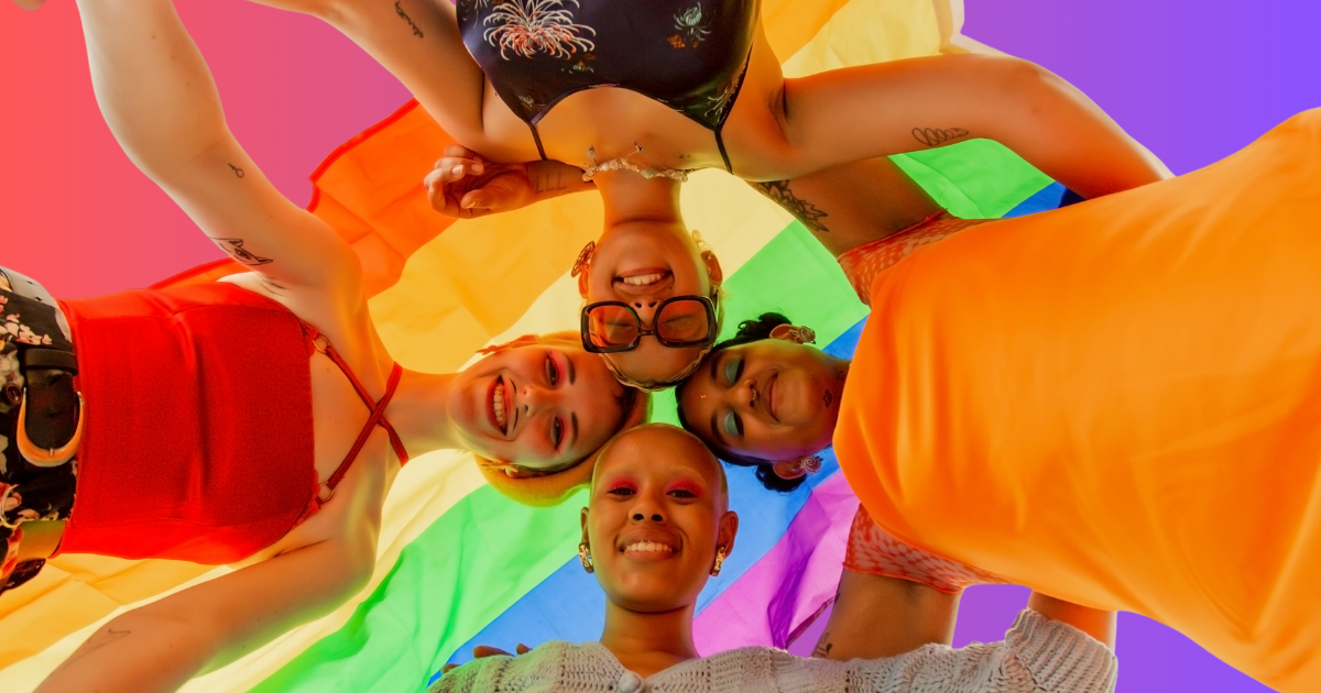 Trans and nonbinary teens encircling one another, expressing joy and fulfillment, because of their supportive families and communities